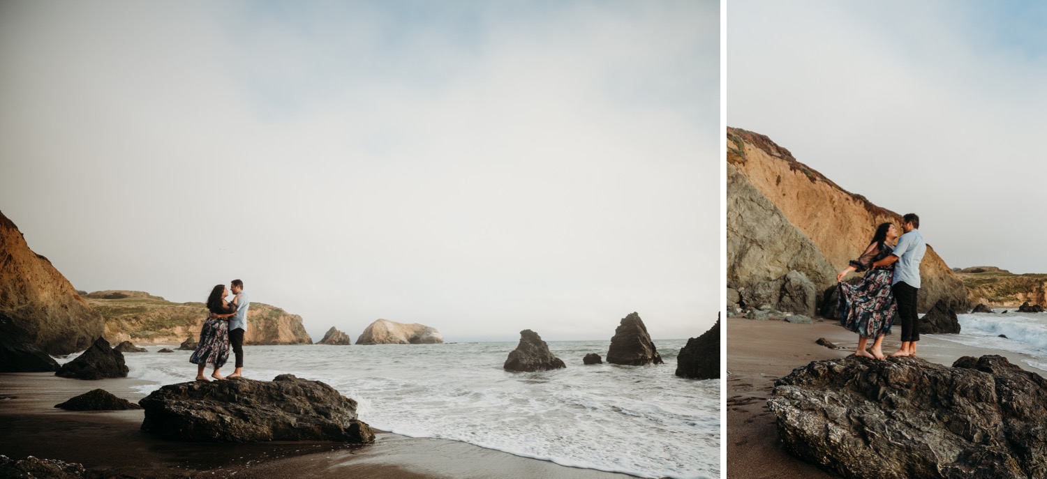 Two images of couple standing on a rock during their Rodeo Beach photoshoot. The woman wears a flowing dress and leans into her fiance.