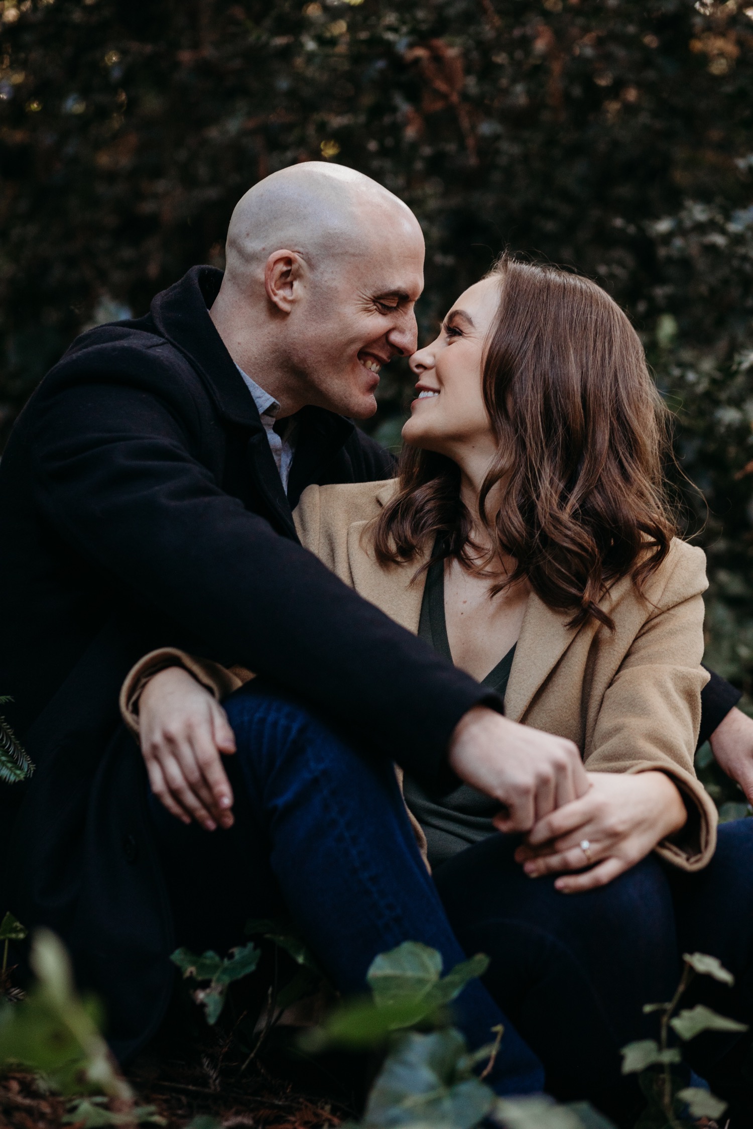 Couple smiles touching noses on their San Francisco engagement photoshoot.