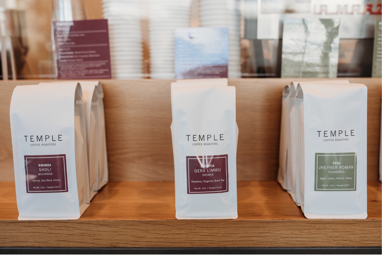 Three bags of coffee beans on a shelf at Temple Coffee Roasters in Davis, CA. 