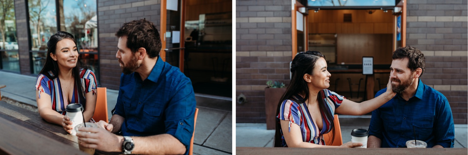 Couple talks while drinking coffee during their downtown Davis engagement photos.
