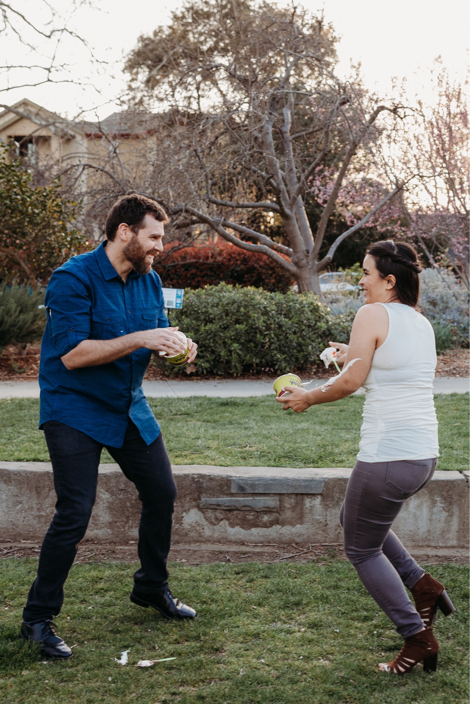 Couple has ice cream food fight during their Davis engagement photos.