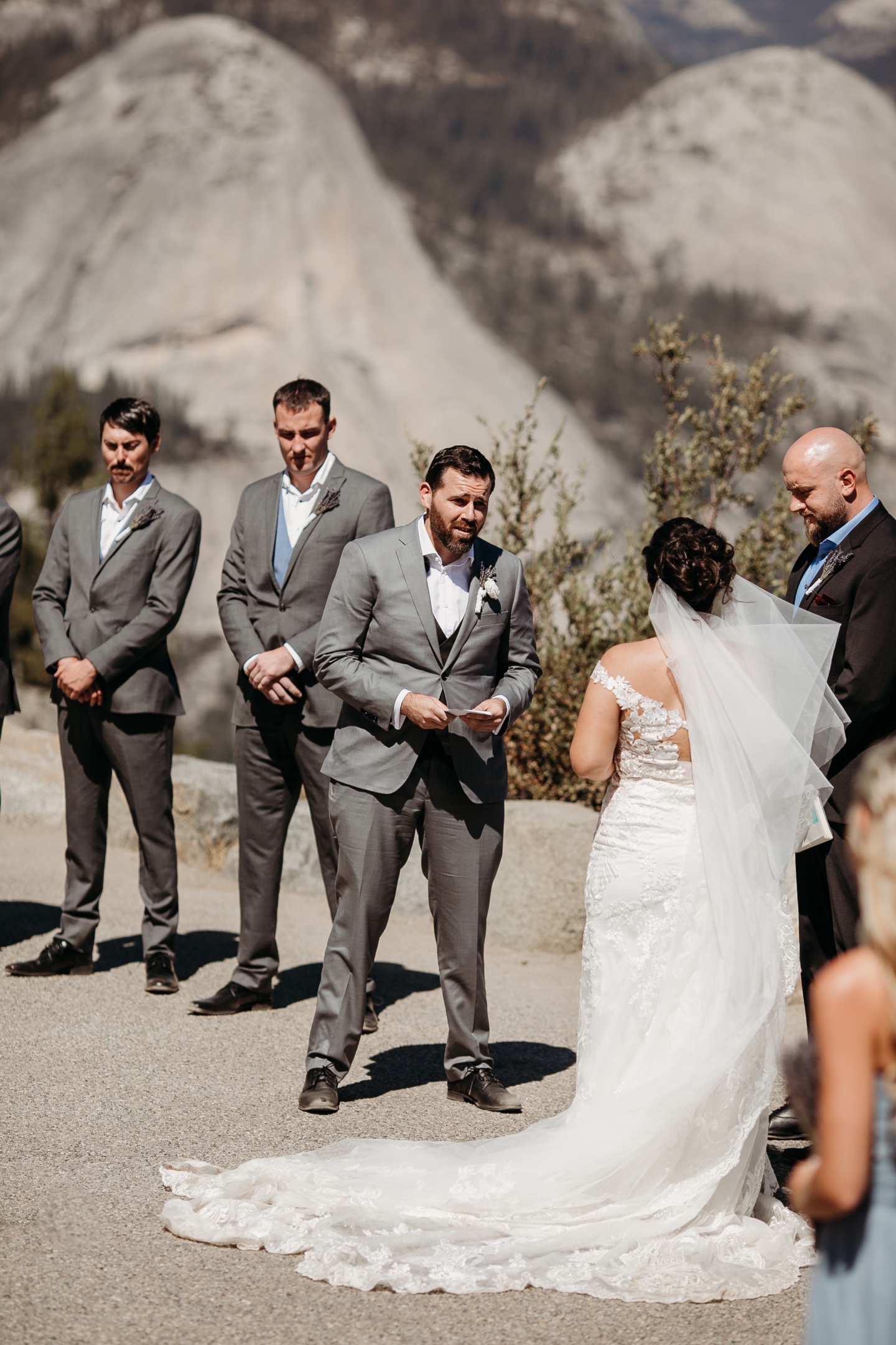 Groom reads his vows to the bride during their Yosemite wedding ceremony.