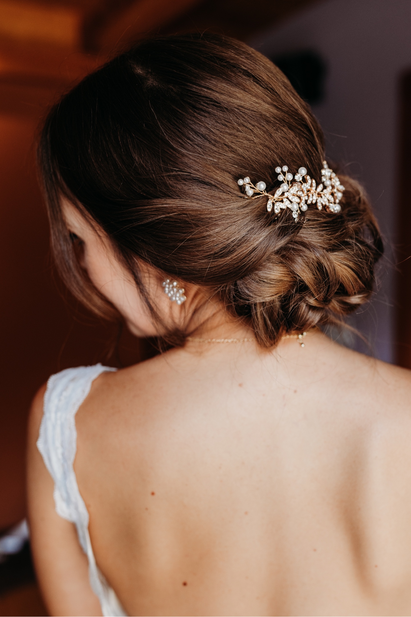 Close up of the brides hair as she looks over her shoulder. Sacramento wedding photography by Liz Koston.