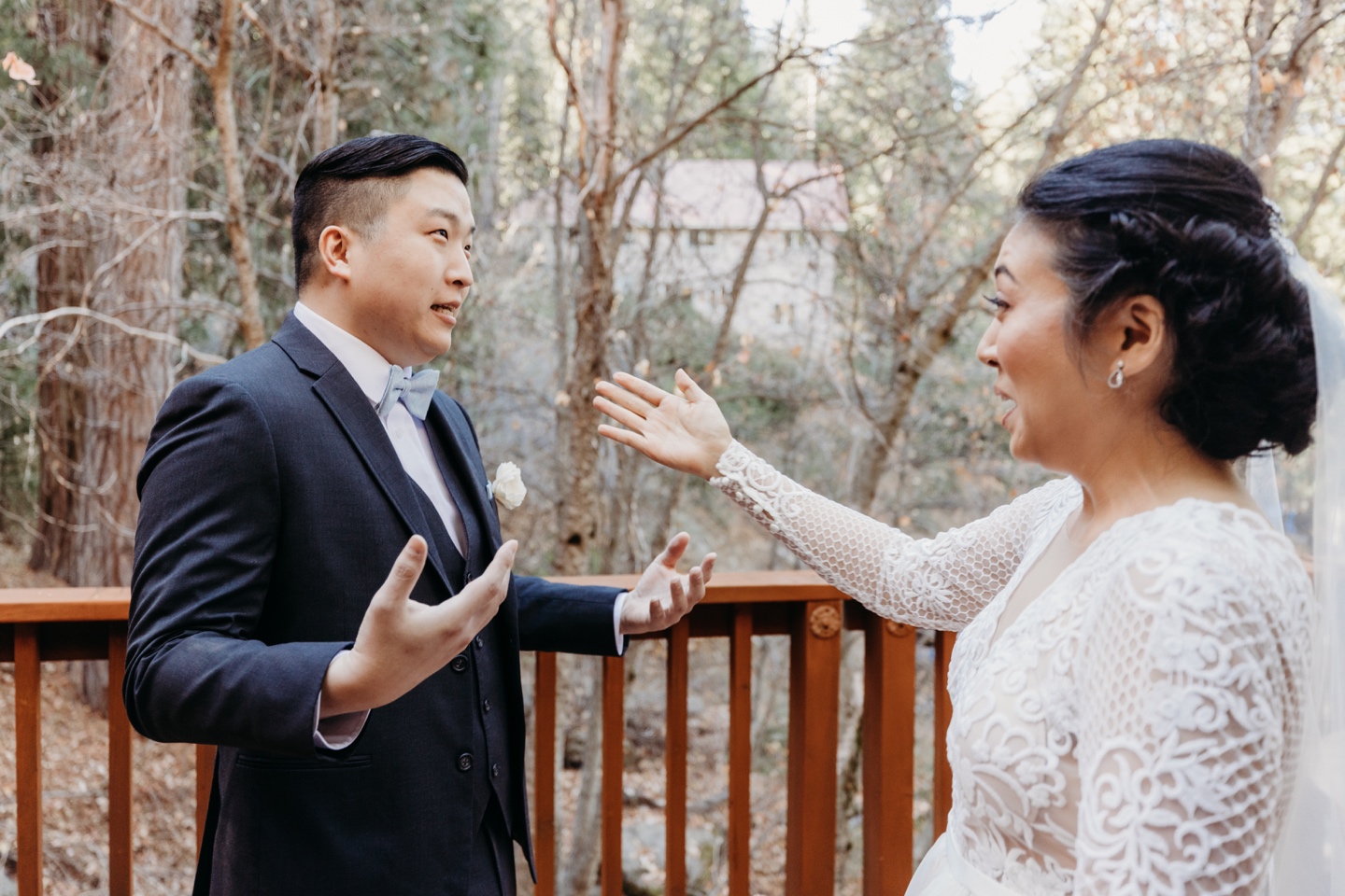 Bride and groom talk excitedly during their first look before going into Yosemite National Park to elope!