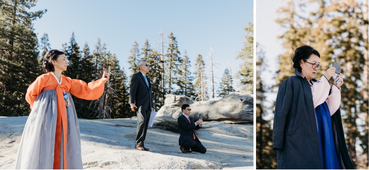 Mothers of the bride and groom take pictures with their smartphones of the view in Yosemite.