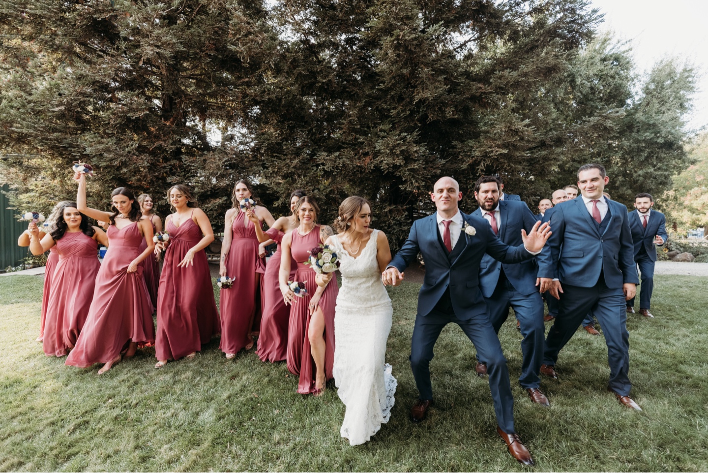 Bride and groom dance with the bridal party before their wedding at Julietta winery in Sacramento, California.. Wedding photography in Sacramento by Liz Koston.