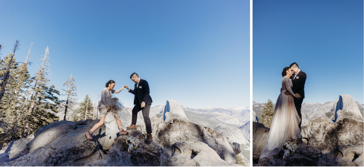 Groom helps bride cross a rock so they can stand head to head in an embrace overlooking Half Dome in Yosemite National Park