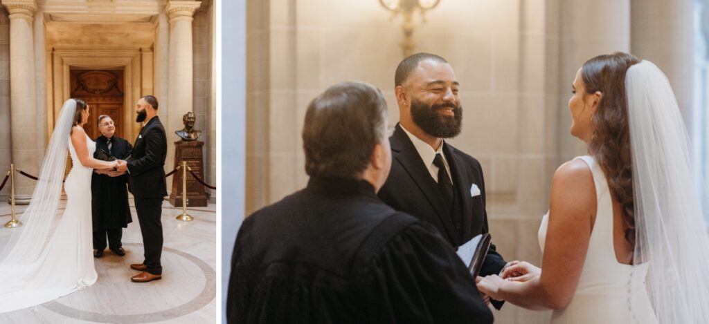 Bride and groom hold hands and smile wide at each other as the officiant performs their civil ceremony during their San Francisco City Hall elopement. Photo by Liz Koston Photography.