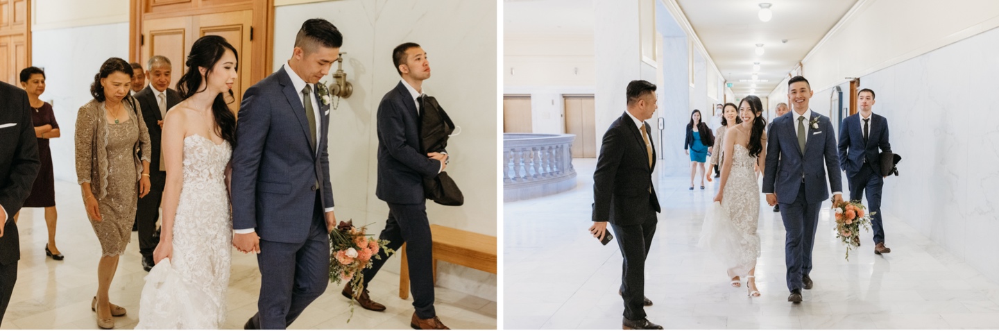 Bride and groom walk hand in hand through San Francisco City Hall with their family and friends after their elopement ceremony.