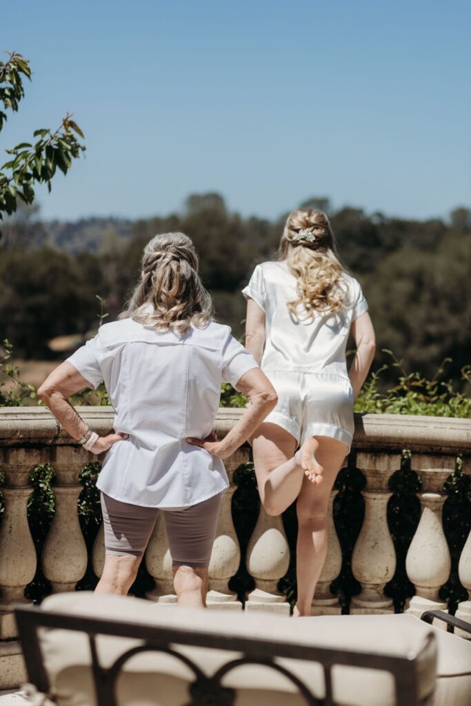 Bride and her mom look out over Helwig Winery. Liz Koston Photography. 