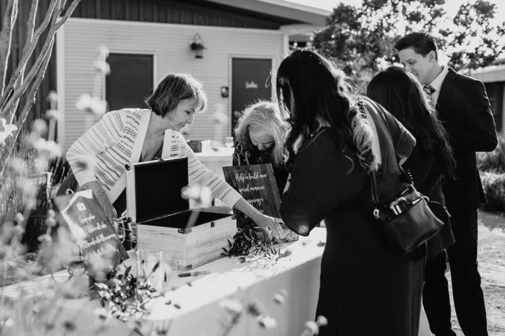 Guests fill out advice cards at a beautiful table at Helwig Winery. Liz Koston Photography.